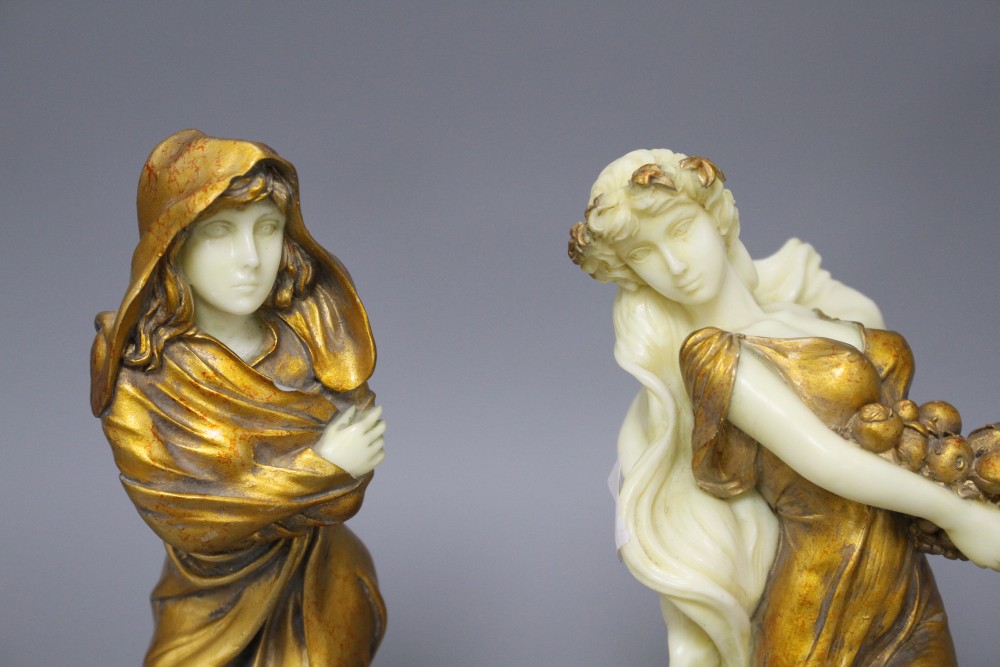 A set of four Italian gilt resin figures of maidens representing The Seasons, stamped STT, height 20cm